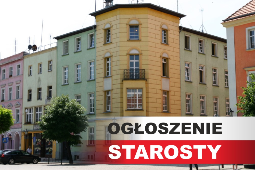 Na zdjęciu budynek starostwa powiatowego w Dzierżoniowie. Po prawej stronie drzewo. Na dole w prawym rogu napis Ogłoszenie Starosty