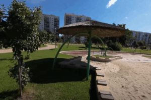 Aleja bajkowych gwiazd parasol i bloki w tle