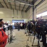 dziennikarze podczas otwarcia magazynu